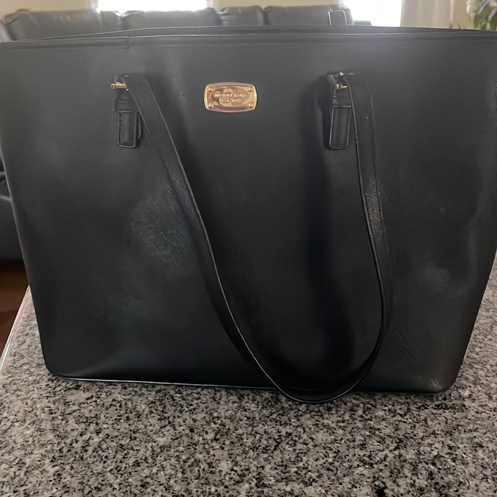 Gently used, black Michael Kors bag.